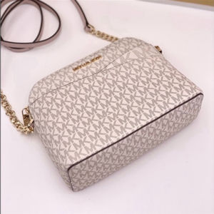 Michael Kors Dome Crossbody
Vanilla Pink